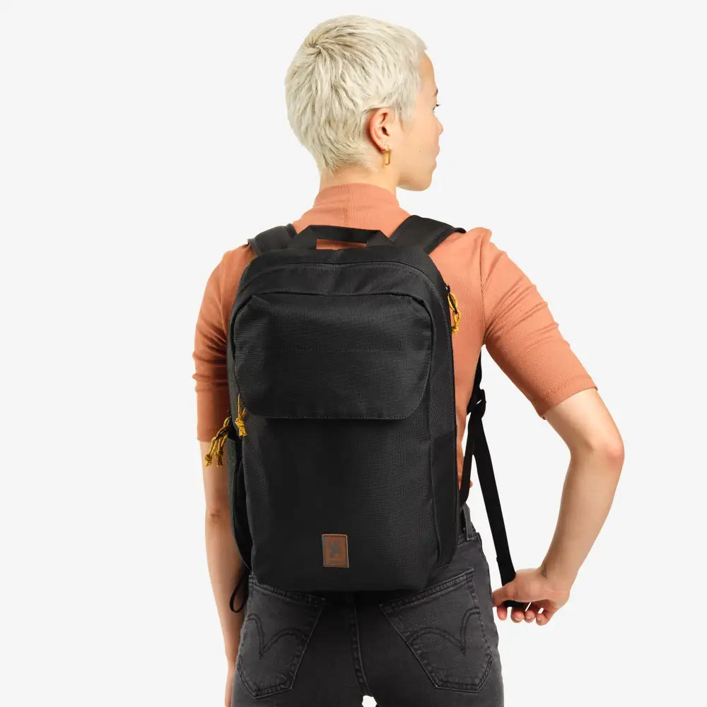 Ruckas Backpack 14L Black. The Ruckas 14L backpack is all about access. Easily get to your gear through the side or top with its 3/4 length main zipper. Made from recycled materials. Stow the essentials, and be ready for the day.