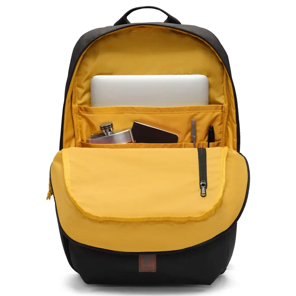 Ruckas Backpack 23L Black. This 23L backpack is all about access. Easily get to your gear through the side or top with its 3/4 length main zipper. Made from recycled materials. Stow the essentials, and be ready for the day.