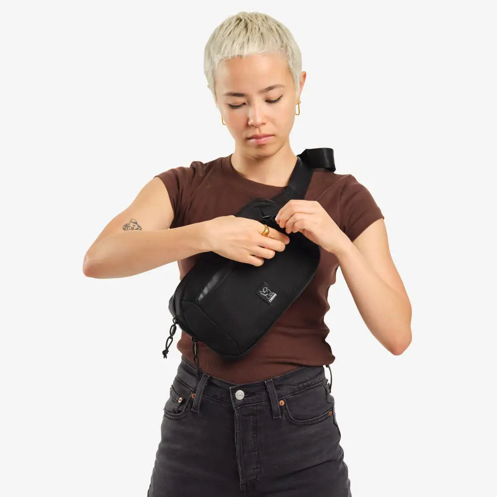 Ziptop Waistpack Black. Super useful on-the-go waistpack, aka fanny pack, which doubles as a sling for your phone, keys, wallet and more. Get where you're going in crazy style.