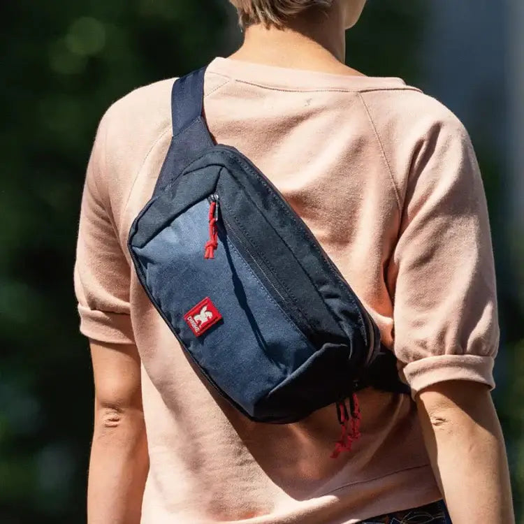 Ziptop Waistpack Navy Tritone. Super useful on-the-go waistpack, aka fanny pack, which doubles as a sling for your phone, keys, wallet and more. Get where you're going in crazy style.