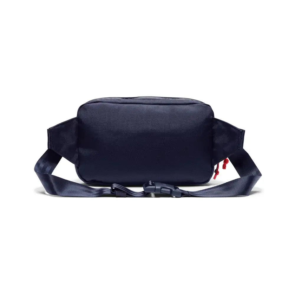 Ziptop Waistpack Navy Tritone. Super useful on-the-go waistpack, aka fanny pack, which doubles as a sling for your phone, keys, wallet and more. Get where you're going in crazy style.