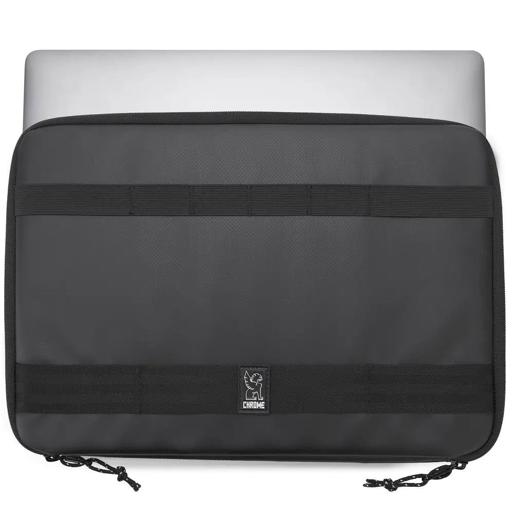 Laptop Sleeve Large. Our large laptop sleeve fits 15" devices. Complete with a handle, use on its own or secure it to our messenger bags with the nylon and hook and loop lashing points.